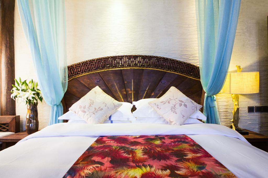 Lijiang Yuntian Palace Hotel Rum bild