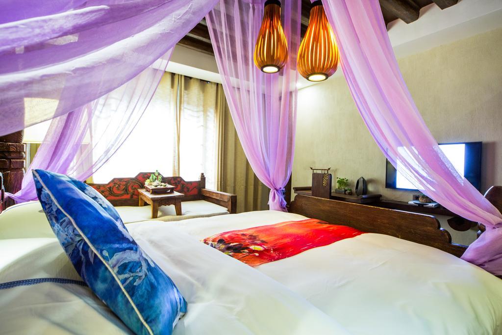 Lijiang Yuntian Palace Hotel Rum bild