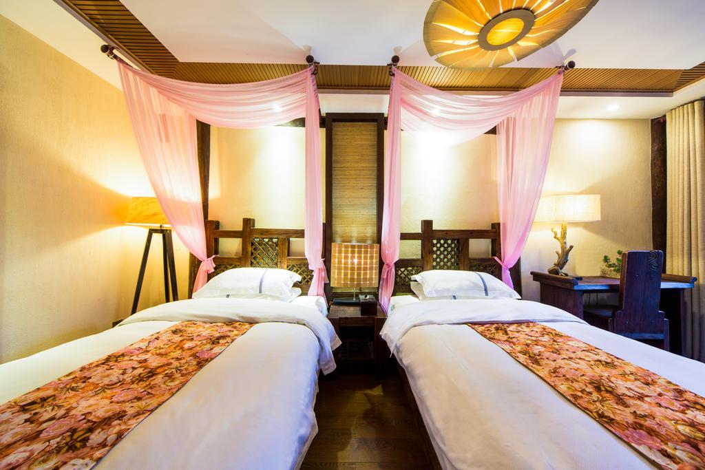 Lijiang Yuntian Palace Hotel Rum bild